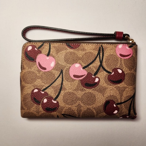 COACH CORNER ZIP WRISTLET IN SIGNATURE CANVAS WITH CHERRY PRINT CZ450 Bags